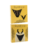 Tanga noir en dentelle avec bijou losanges dorés